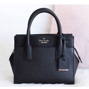 Exquisite barely used black, leather Kate Spade medium “Cameron” canvas tote.